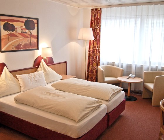 Example of a double-/ triple bed room, © A. Rüber
