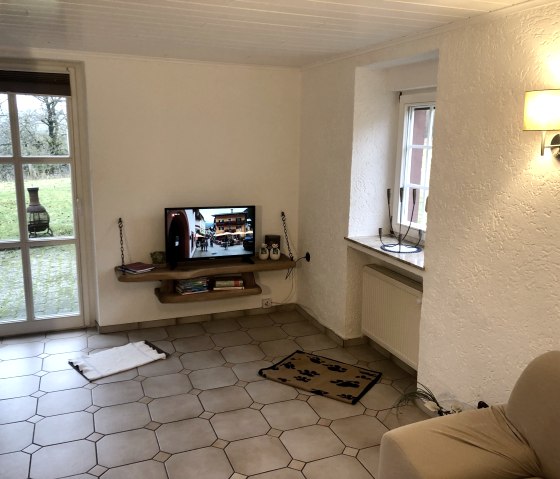 Wohnzimmer mit Ausgang zur Terrasse